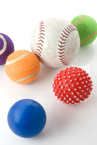 Six different coloured sports balls.