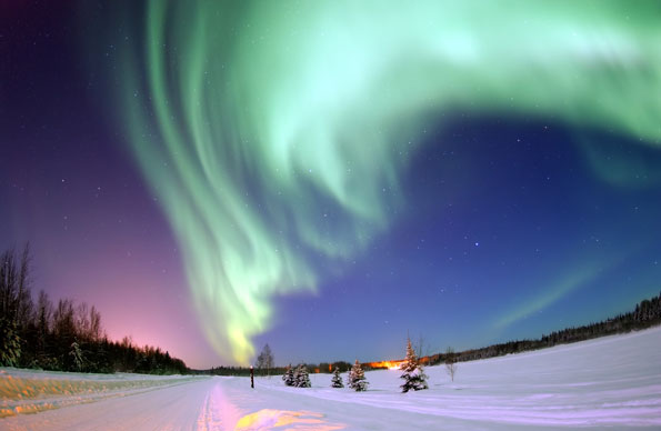 Aurora over a winter landscape.