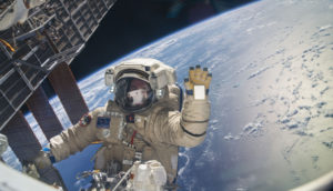 Astronaut in spacesuit with Earth in background