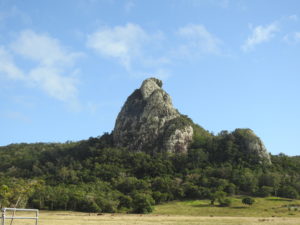 A steep, rocky mountain.