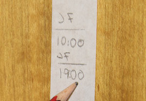 Two marks on a piece of masking tape. the top mark says JF 10:00. the bottom mark says JF 19:00