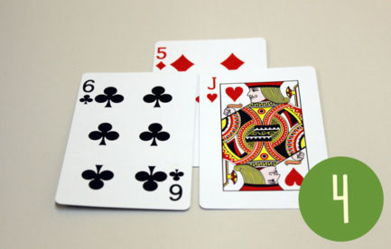 Three cards in a triangle shape.