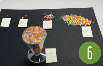 a measuring cup full of sprinkles.