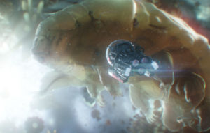 Image of a tardigrade and a miniature tardigrade wearing a helmet.