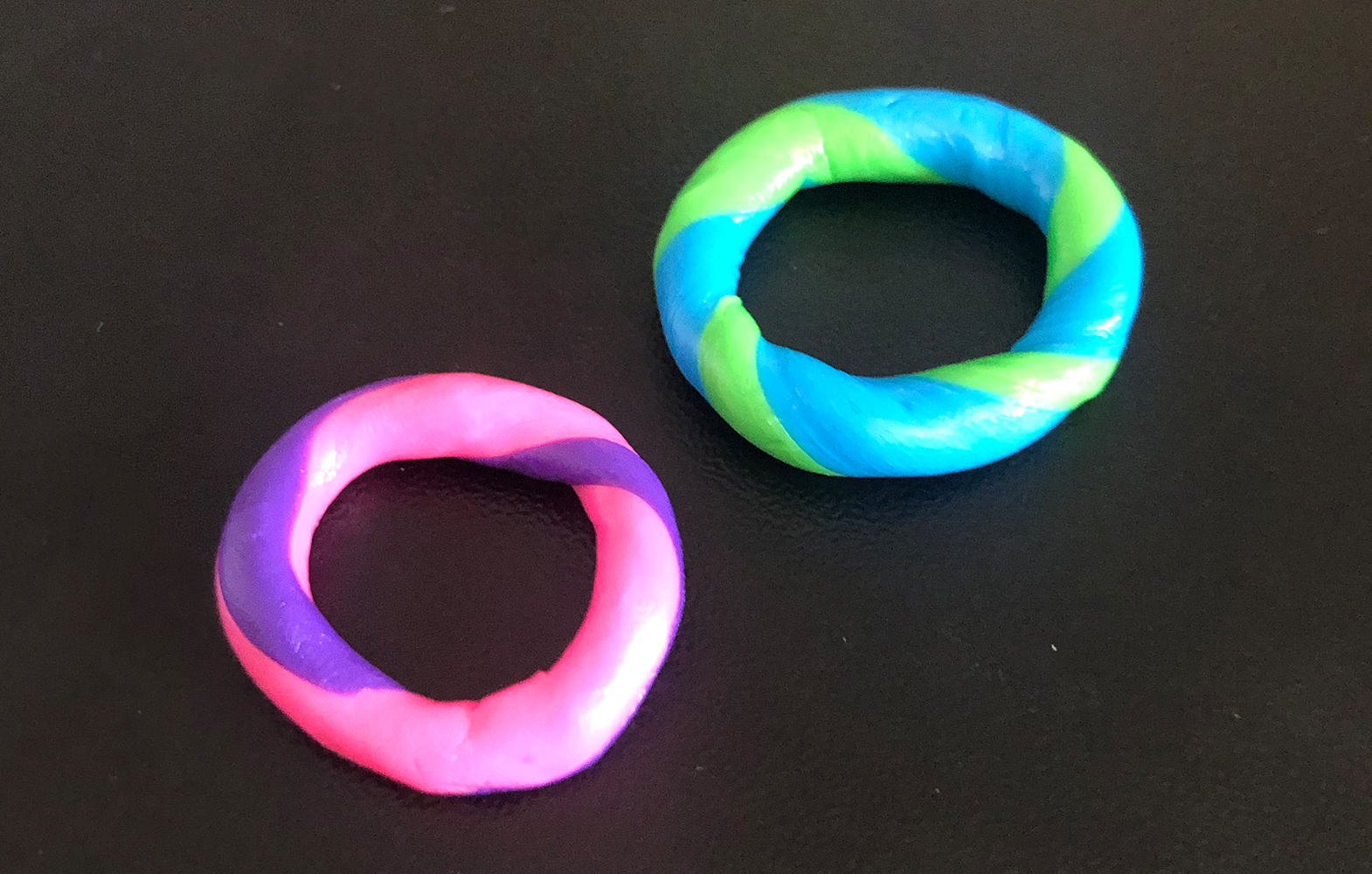 Two coloured clay rings.
