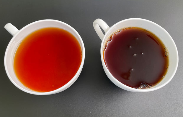 Two cups of tea - one is much lighter than the other