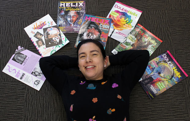 Woman surrounded by magazines